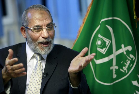 FILE - In this Tuesday, Oct. 26, 2010 file photo, Muslim Brotherhood supreme leader Mohammed Badie talks during an interview with the Associated Press at his office in Cairo Egypt. Egyptian security officials say the Muslim Brotherhood's supreme leader ha