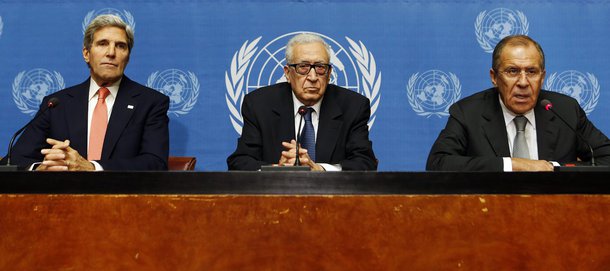 U.S. Secretary of State John Kerry (L) sits with U.N. Special Representative Lakhdar Brahimi (C) and Russian Foreign Minister Sergei Lavrov as they each make a statement to the press after a meeting discussing the ongoing problems in Syria at the United N
