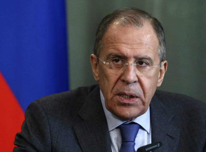 Russian Foreign Minister Sergei Lavrov takes part in a news conference in Moscow March 8, 2014. Lavrov said on Saturday the Ukrainian government was taking orders from extremists and denied Moscow had any direct role in the crisis in Crimea.  REUTERS/Serg
