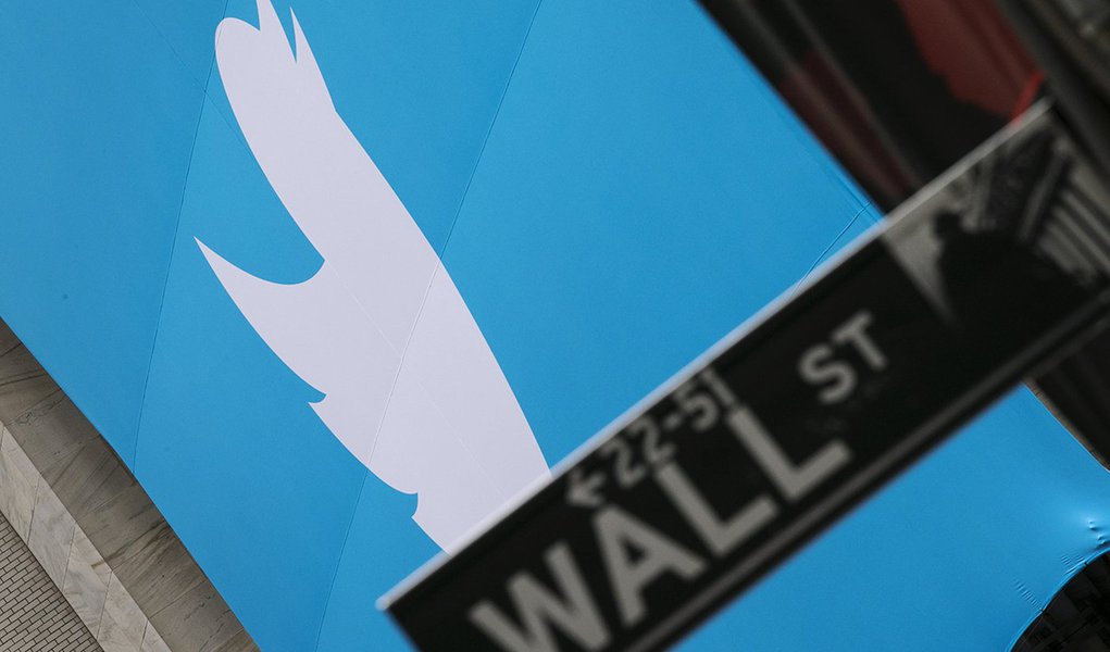A sign displays the Twitter logo on the front of the New York Stock Exchange ahead of the company's IPO in New York, November 7, 2013. Twitter Inc could face volatile trade in its debut Thursday on the New York Stock Exchange, analysts said, but they rema