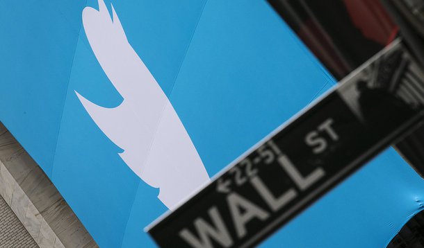A sign displays the Twitter logo on the front of the New York Stock Exchange ahead of the company's IPO in New York, November 7, 2013. Twitter Inc could face volatile trade in its debut Thursday on the New York Stock Exchange, analysts said, but they rema