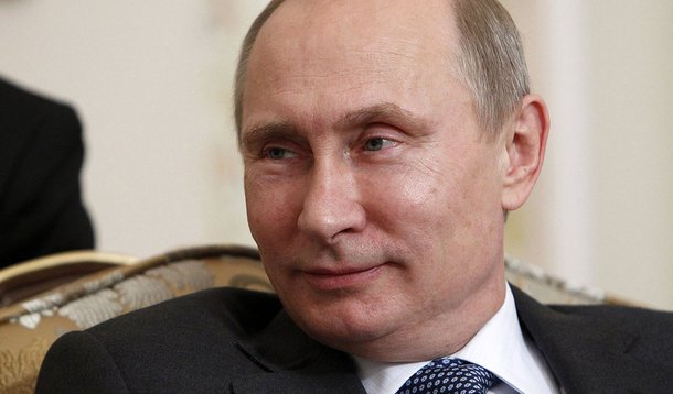 Russian President Vladimir Putin looks on during his meeting with Crown Prince of Abu Dhabi Sheikh Mohammed bin Zayed al-Nahyan at the Novo-Ogaryovo state residence, outside Moscow September 12, 2013. REUTERS/Maxim Shemetov (RUSSIA - Tags: POLITICS HEADSH