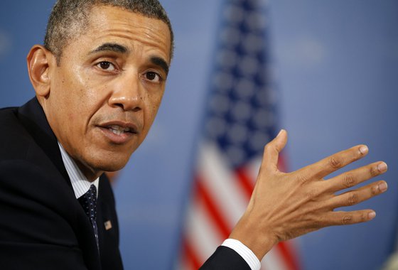 U.S. President Barack Obama speaks during his meeting with French President Francois Hollande at the G20 Summit in St. Petersburg September 6, 2013. REUTERS/Kevin Lamarque  (RUSSIA - Tags: BUSINESS POLITICS)