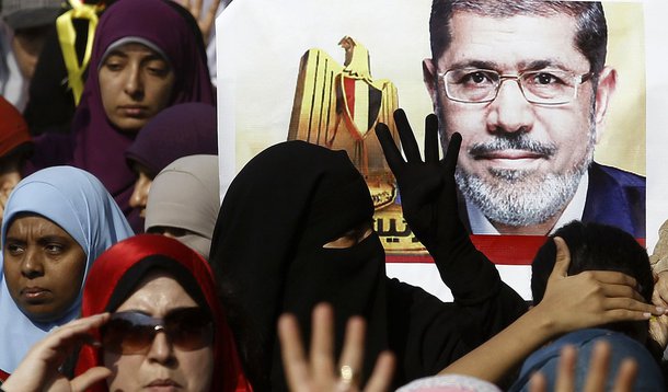 Supporters of the Muslim Brotherhood and ousted Egyptian President Mohamed Mursi take part in a protest against the military and interior ministry in the southern suburb of Maadi, on the outskirts of Cairo November 1, 2013. U.S. Secretary of State John Ke