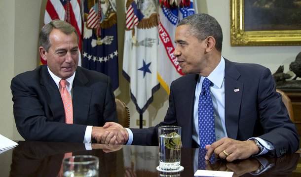 FILE - This Nov. 16, 2012 file photo shows President Barack Obama shaking hands with House Speaker John Boehner of Ohio in the Roosevelt Room of the White House in Washington, during a meeting to discuss the deficit and economy. Congress and the White Hou