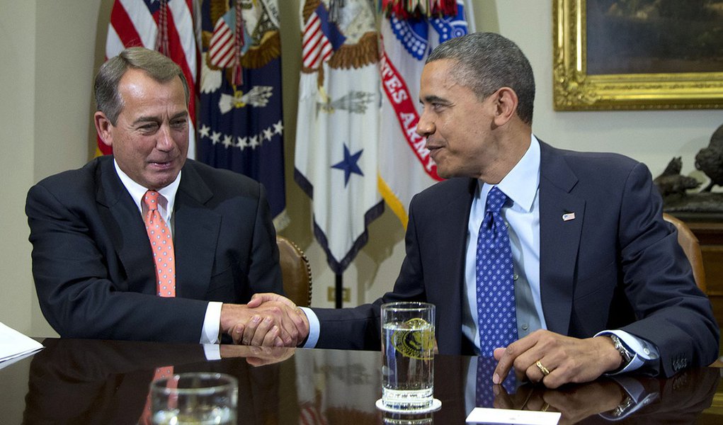 FILE - This Nov. 16, 2012 file photo shows President Barack Obama shaking hands with House Speaker John Boehner of Ohio in the Roosevelt Room of the White House in Washington, during a meeting to discuss the deficit and economy. Congress and the White Hou