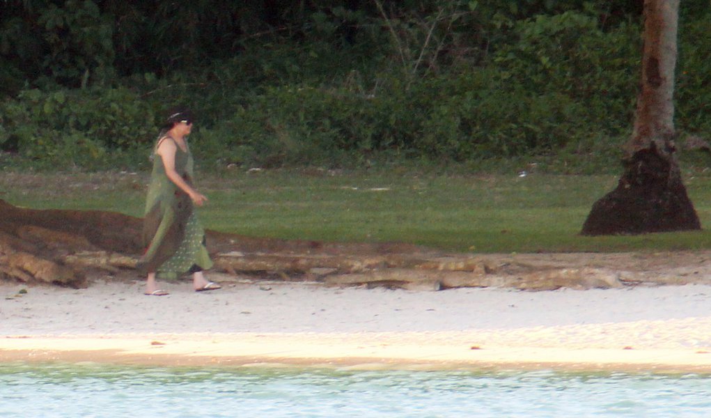 Com os pés na areia, Dilma planeja seu governo