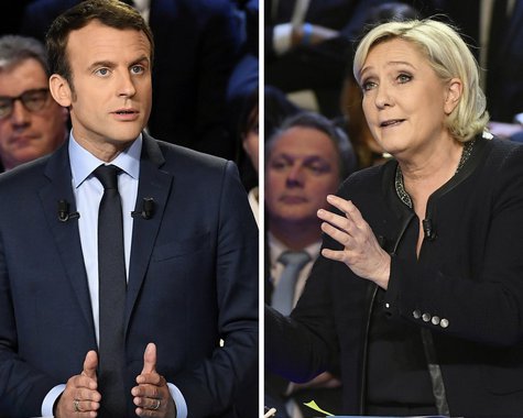 Favorito à eleição presidencial da França, o candidato de centro Emmanuel Macron e sua rival de extrema-direita Marine Le Pen trocaram farpas em Paris neste Dia do Trabalho, quando a campanha eleitoral mais crucial do país em décadas entrou em sua semana final; Macron tentou pintar a líder do partido Frente Nacional como extremista pelo terceiro dia consecutivo, enquanto Le Pen o retratou como um clone do impopular presidente socialista em fim de mandato, François Hollande, para o qual ele trabalhou como ministro da Economia entre 2014 e 2016