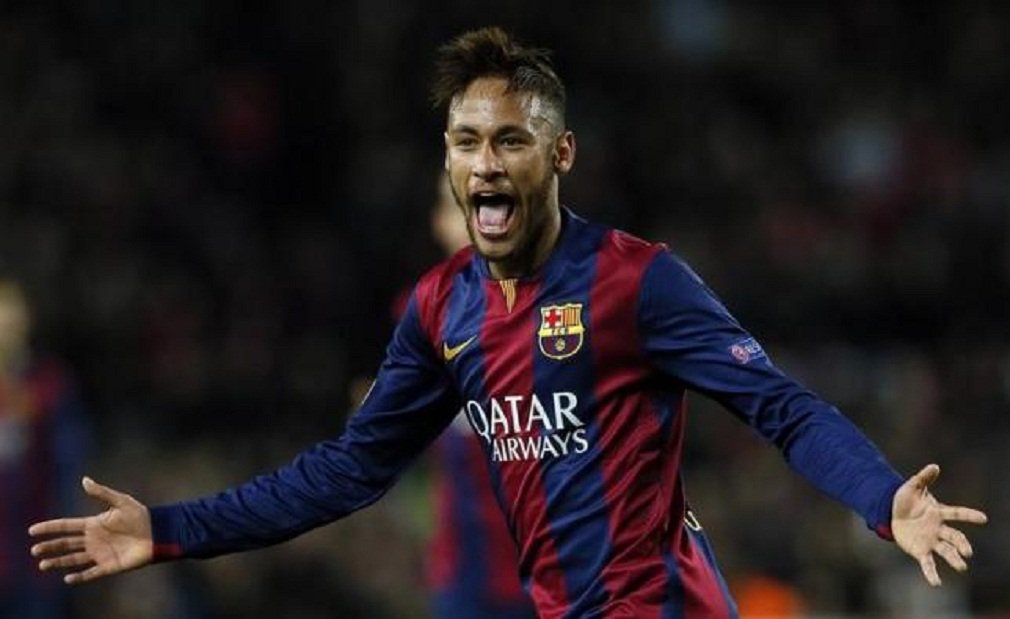 Barcelona's Neymar celebrates after scoring a goal against Paris St Germain during their Champions League Group F soccer match at the Nou Camp stadium in Barcelona, December 10, 2014. REUTERS/Albert Gea