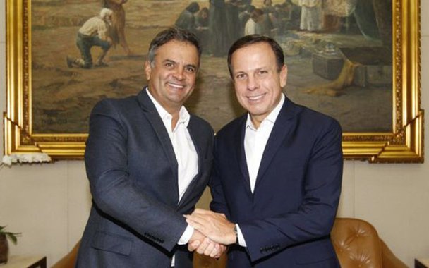 Tentando pavimentar sua pré-candidatura à Presidência da República, o prefeito de São Paulo, João Doria (PSDB), vem buscando uma reaproximação com o grupo do senador e presidente afastado da legenda, Aécio Neves (MG); distanciamento entre eles havia se dado após Doria defender o afastamento do correligionário em virtude dele ter sido denunciado por corrupção no âmbito da Lava Jato; Doria disputa a pré-candidatura tucana com o governador de São Paulo, Geraldo Alckmin, que briga com Aécio pelo comando da legenda