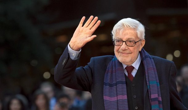 Responsável por filmes como "Um Dia Muito Especial" e "A Família", o cineasta foi um dos produtores mais destacados do cinema italiano e o primeiro-ministro, Matteo Renzi, declarou que sua morte "deixa um enorme vazio na cultura italiana"; ganhador do prêmio de melhor roteiro no Festival de Cannes em 1980 por "O Terraço", ele trabalhou com alguns dos mais destacados representantes do cinema do país, como Marcello Mastroianni, Vittorio Gassman, e Sophia Loren, e foi reconhecido como um dos criadores da moderna comédia italiana