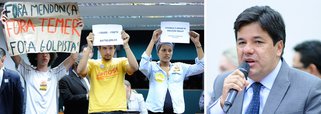 Durante audiência conjunta das comissões de Educação e de Fiscalização Financeira e Controle da Câmara, o ministro interino da Educação, Mendonça Filho, negou que haverá cortes no orçamento da pasta e mudanças na regra de cotas para universidades públicas; deputados petistas apontaram contradições em suas promessas; "Ele diz que vai manter tudo, e se possível ampliar. Mas isso não bate com a política do Temer de congelar os gastos públicos", disse Ságuas Moraes (PT-MT); Mendonça foi chamado de "golpista" por estudantes