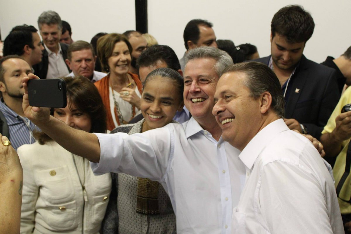 Confirmação de Marina Silva como candidata à Presidência da República aumenta a preocupação do PSB com a manutenção do programa de Eduardo Campos e com os palanques estaduais desenhados pelo ex-governador pernambucano, que incomodavam a ex-senadora; candidato pelo PSB ao governo do Distrito Federal, Rodrigo Rollemberg, tenta atenuar a situação