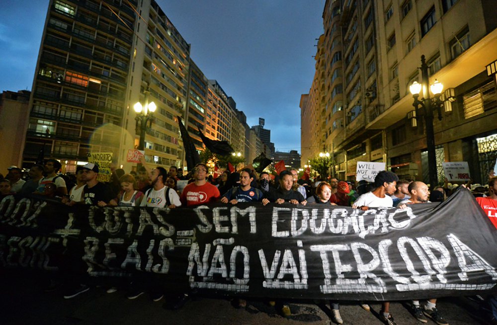 Demonstrators protest against the government's expenditure for the 2014 FIFA World Cup in Sao Paulo, Brazil on February 22, 2014. AFP PHOTO / NELSON ALMEIDA