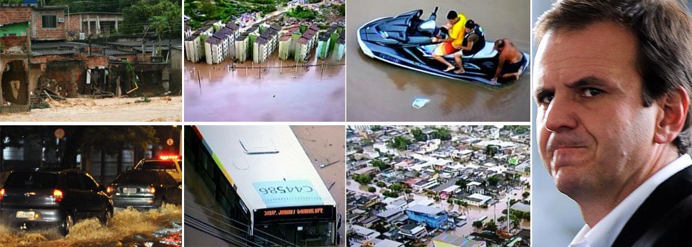 Prefeito do Rio diz que "a cidade está funcionando normalmente", apesar dos alagamentos, vias bloqueadas e caos que as chuvas têm causado; mesmo assim, pediu para que a população evite sair de casa; "é sempre bom que quem não tiver que sair que evite o deslocamento", afirmou Eduardo Paes, em entrevista à TV Globo