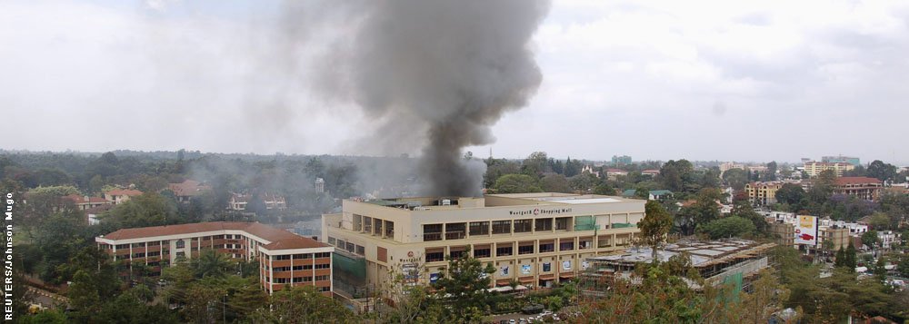 Smoke rises from the Westgate shopping centre in Nairobi following a string of explosions during the third day of a stand-off between Kenyan security forces and gunmen inside the building September 23, 2013. Powerful explosions sent thick smoke billowing 