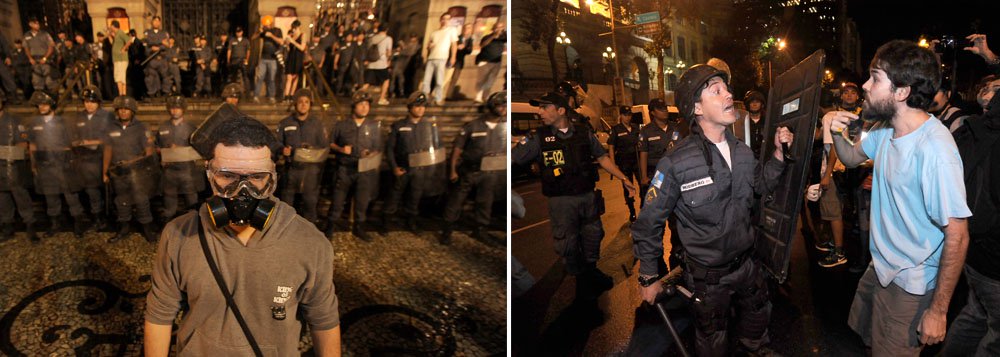 "Baile de Máscaras" em frente à Câmara Municipal, na Cinelândia, terminou em confusão, com duas pessoas detidas. PMs usaram liminar do Ministério Público do Rio que permite a abordagem de mascarados em busca de identificação. A votação do projeto de lei sobre o tema, de autoria de Domingos Brazão e Paulo Melo, ambos deputados estaduais pelo PMDB, foi adiada pela Alerj para semana que vem