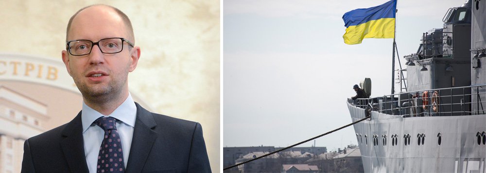 Morte de militar ucraniano que estava em base atacada na principal cidade da Crimeia, Simferopol, é a primeira resultante da crise na região; primeiro-ministro Arseny Yatseniuk denunciou o fato como um "crime de guerra"; Ministério da Defesa da Ucrânia informou que seus soldados na Crimeia estão "autorizados a usar armas"