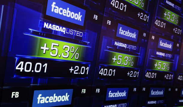 Ações do Facebook encerram estreia com alta inferior a 1%