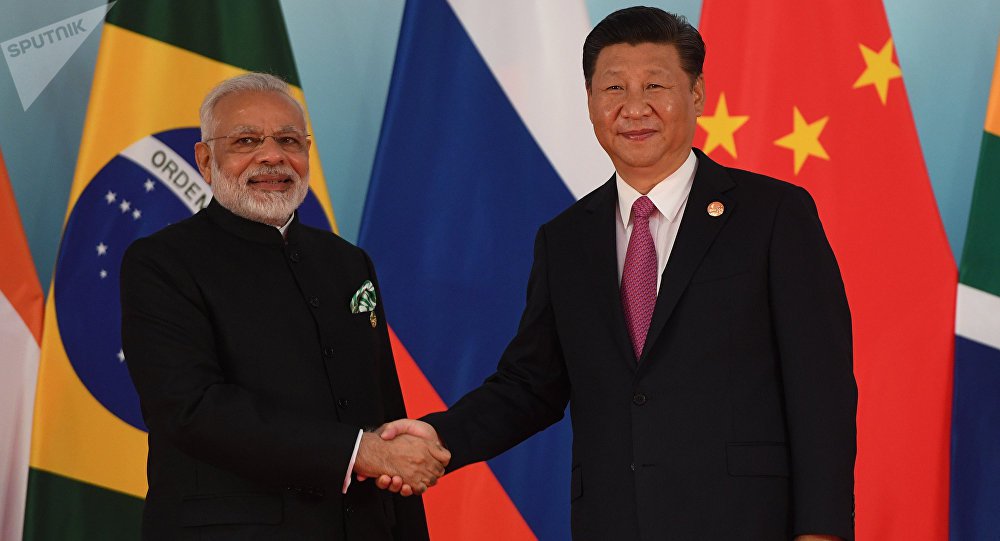 China pede que Índia se una a esforços para conter perseguição dos EUA
