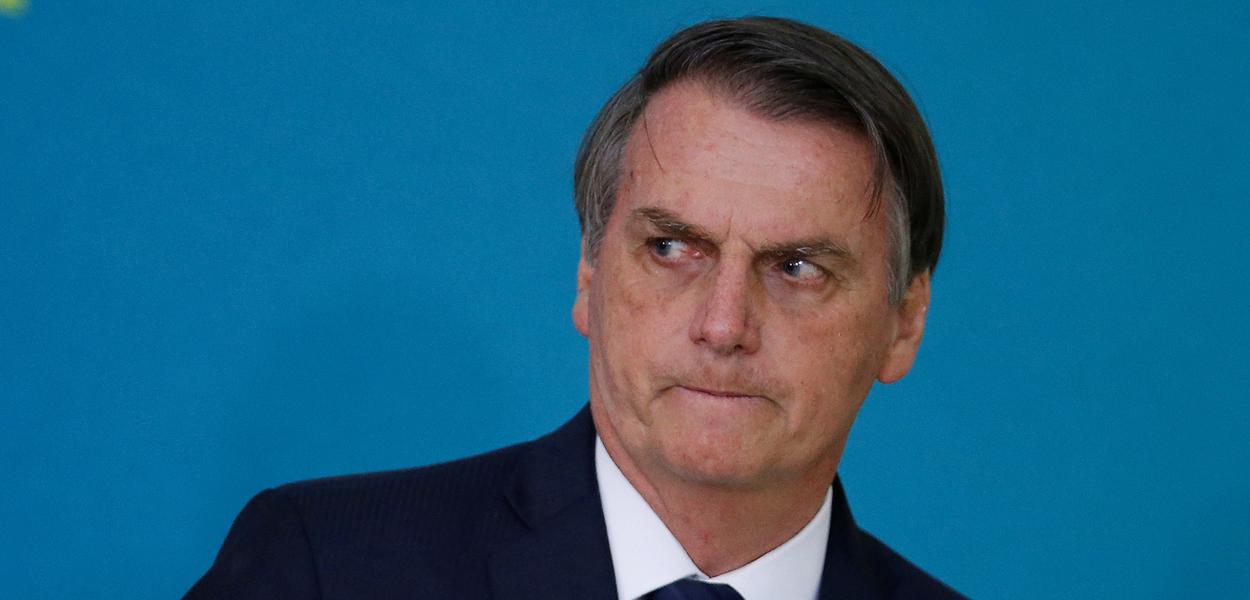 Brazil's President Jair Bolsonaro attends a ceremony for the presentation of the 2nd phase of the advertising campaign of the pension reform bill at the Planalto Palace in Brasilia, Brazil May 20, 2019. REUTERS/Adriano Machado