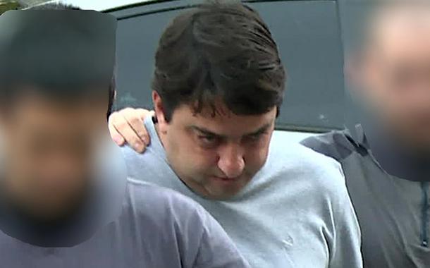 Bruno Pupe Cancella, um dos presos em operação contra a milícia, chega à Cidade da Polícia