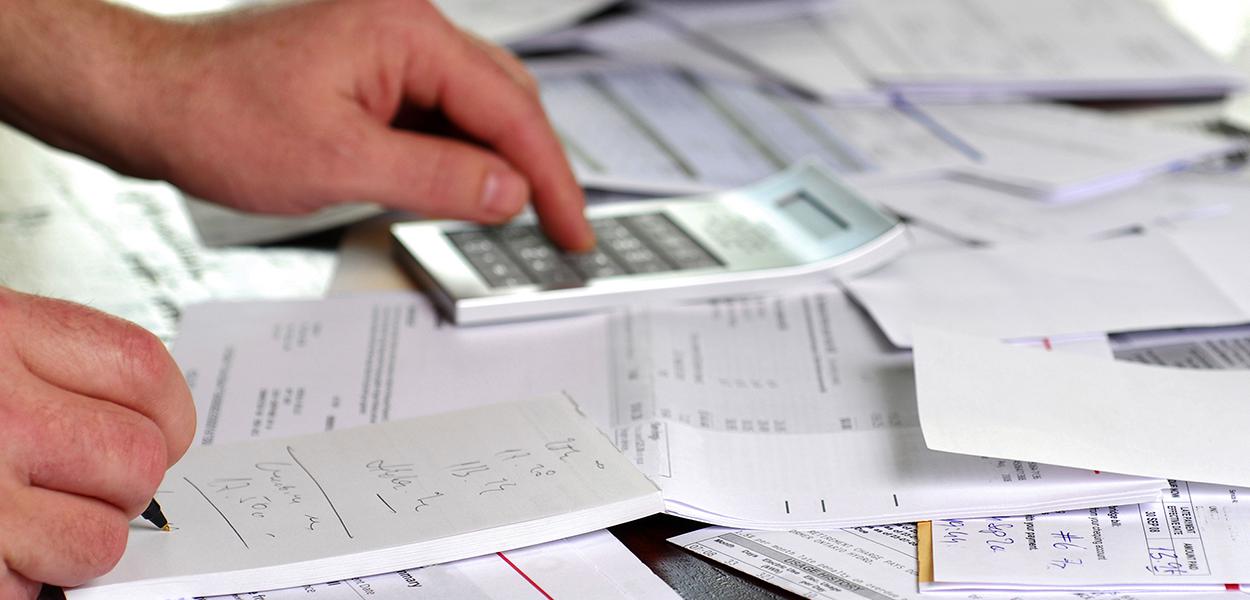 A large amount of bills spread all over the place