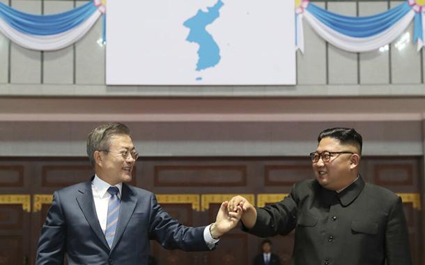 Os presidentes Moon Jae-in (Sul) e Kim Jong-un (Norte)