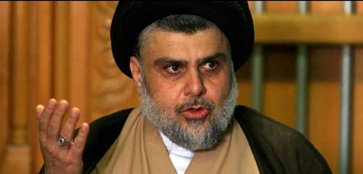 Clérigo xiita iraquiano Moqtada al-Sadr convoca uma marcha de iraquianos.