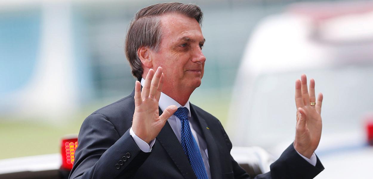 Brazil's President Jair Bolsonaro gestures as he leaves the Alvorada Palace in Brasilia, Brazil December 12, 2019. REUTERS/Adriano Machado