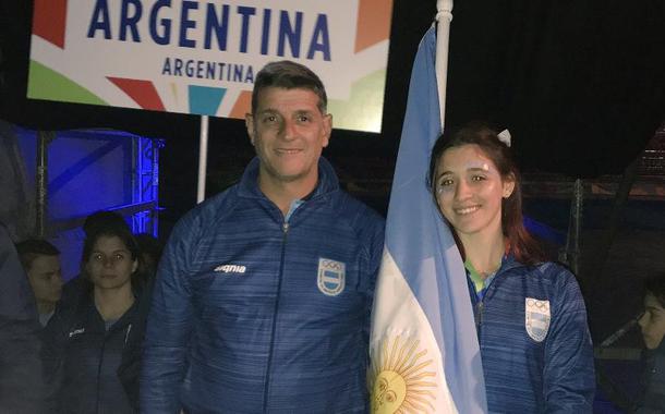 Diego Gusmán e a nadadora Delfina Pignatiello