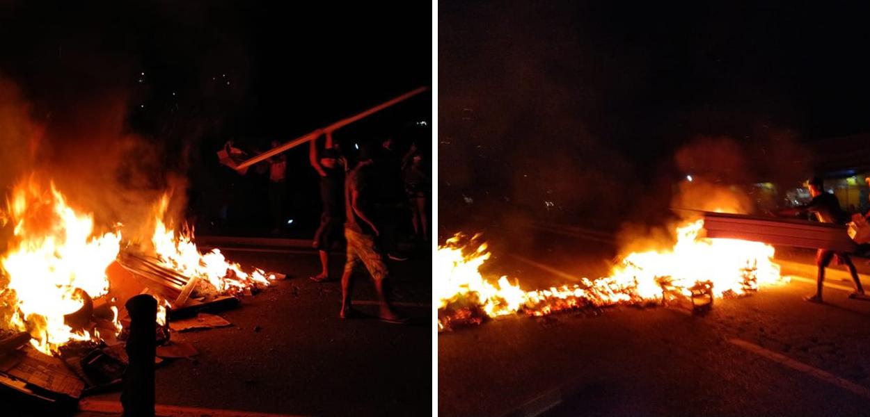 Manifestantes queimam materiais e interditam Rio-Santos em protesto contra feriado prolongado em SP