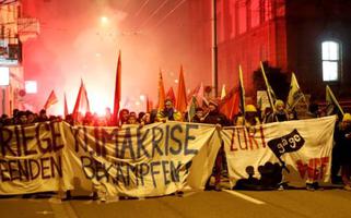 Demonstrators protest against the 50th Davos World Economic Forum