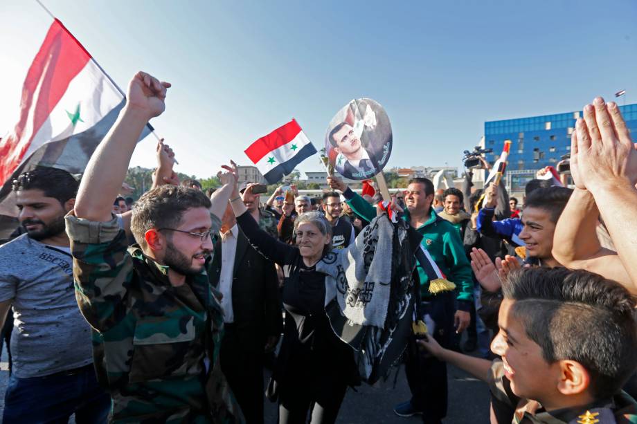 Protesto de sírios em defesa de Bashar Al Assad