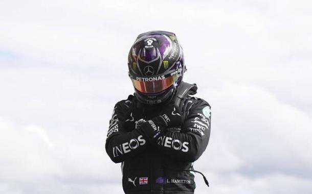 epa08633705 British Formula One driver Lewis Hamilton of Mercedes-AMG Petronas reacts after he took pole position during the qualifying session at the Spa-Francorchamps race track in Stavelot, Belgium, 29 August 2020. The 2020 Formula One Grand Prix of Belgium will take place on 30 August 2020.  EPA/Francois Lenoir / Pool