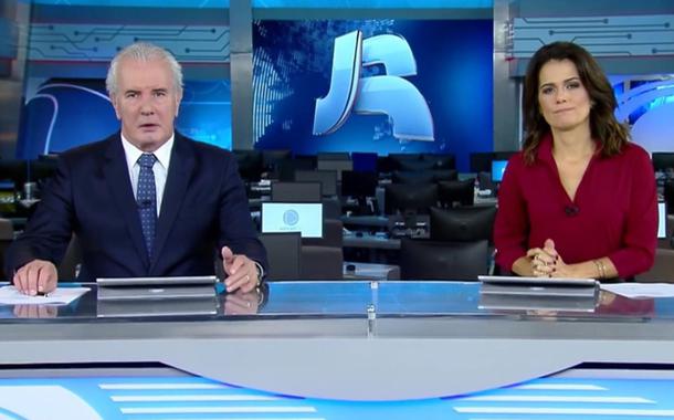 Jornalistas Celso Freitas e Adriana Araújo no Jornal da Record de 11 de junho de 2019