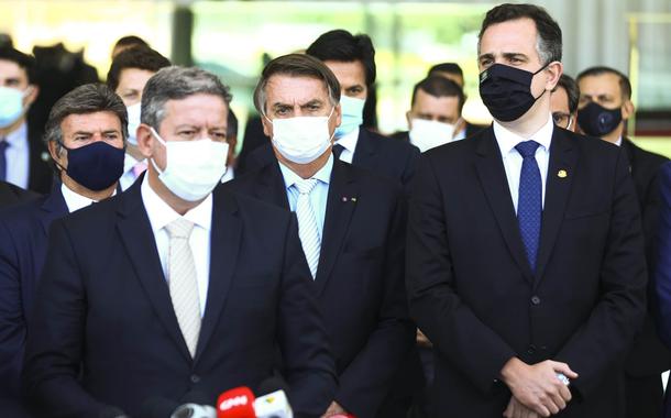 Presidente do STF, Luiz Fux, o presidente da Câmara, Arthur Lira, e o presidente Jair Bolsonaro, durante declaração após reunião com ministros e governadores