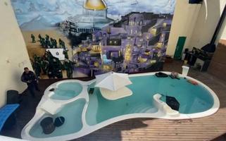 Painel com reprodução da cidade de Jerusalém na casa do traficante Peixão