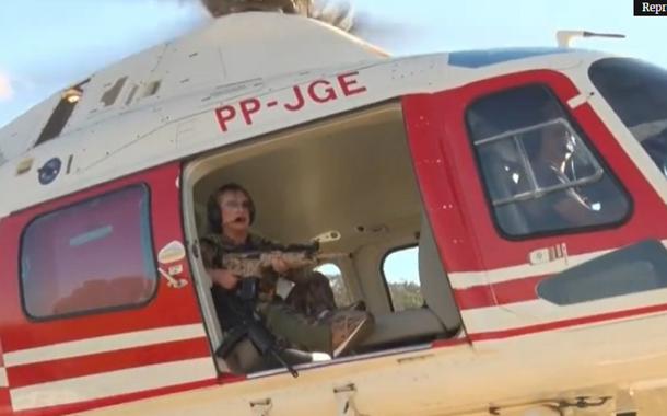 Com fuzil e helicóptero, deputada sai “à caça” de Lázaro. Veja vídeo