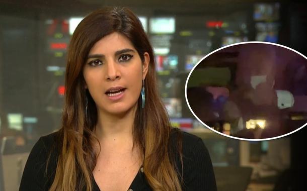 Andréia Sadi e Queiroga fazendo gesto obsceno