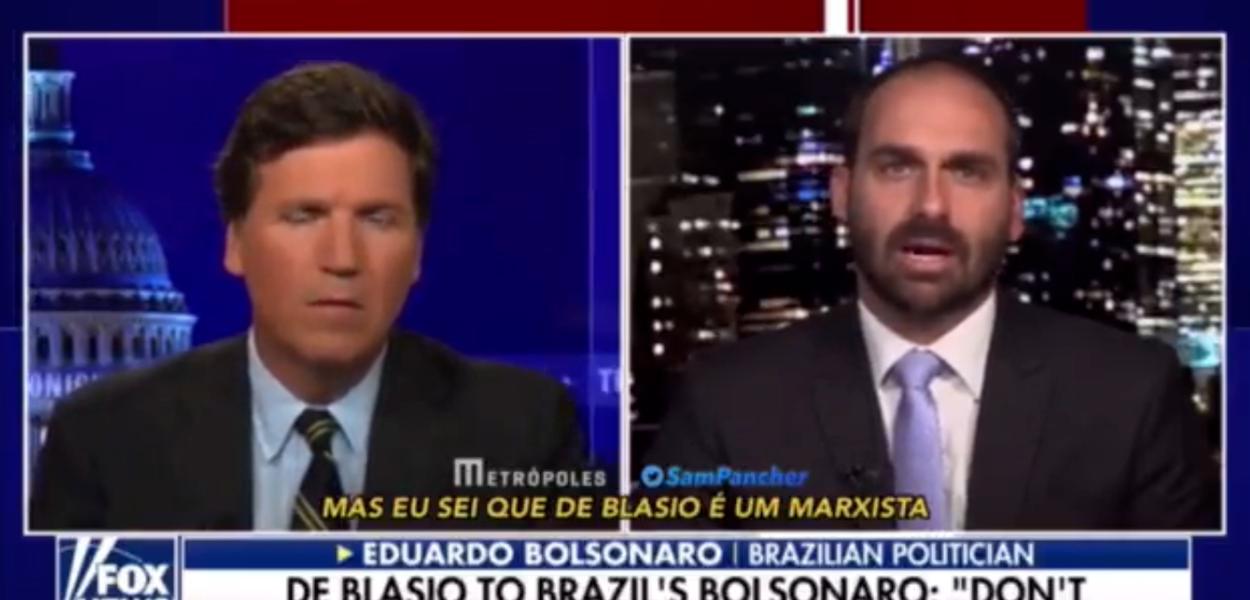 Tucker Carlson e Eduardo Bolsonaro