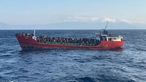 epa09552483 A handout photo made available by the Hellenic Coast Guard shows a ship carrying migrants off the coast of Crete, Greece, 29 October 2021. The cargo ship with a large number of migrants on board was stranded in the sea off Crete Island.  EPA/HANDOUT/HELLENIC COAST GUARD HANDOUT HANDOUT HANDOUT EDITORIAL USE ONLY/NO SALES