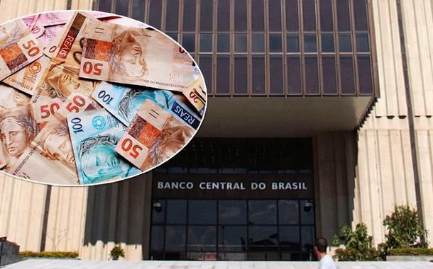 Notas de reais e fachada do Banco Central