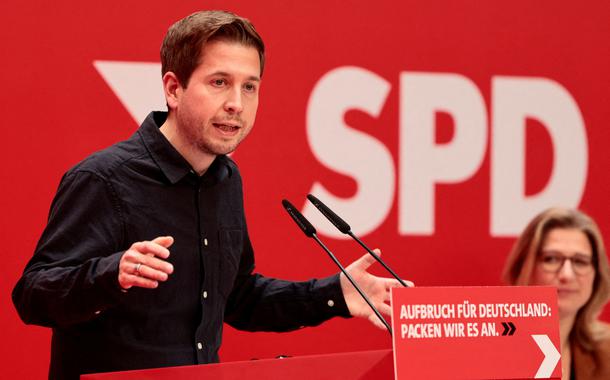 FILE PHOTO: Kevin Kuehnert of Germany's Social Democratic Party (SPD) attends a hybrid party conference at the party headquarters in Berlin, Germany, December 4, 2021. REUTERS/Hannibal Hanschke/Pool