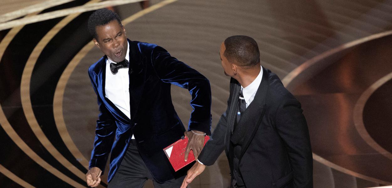 Ator Chris Rock reage após levar tapa de Will Smith durante cerimônia do Oscar