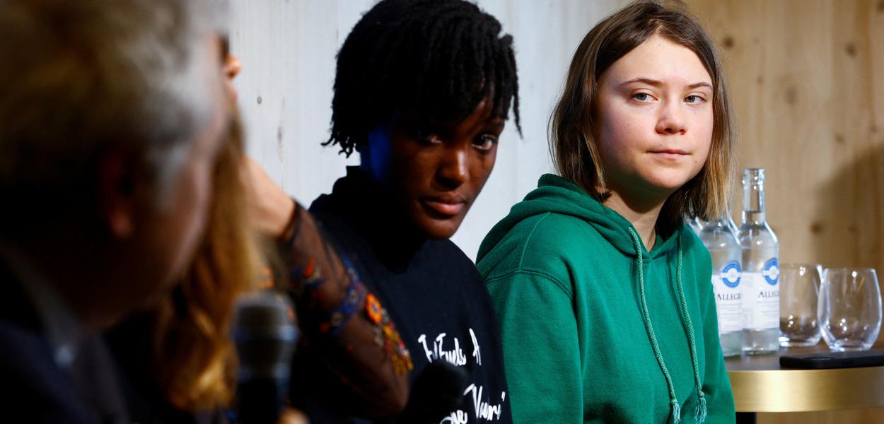 Ativistas do clima Greta Thunberg e Vanessa Nakate no Fórum Econômico Mundial, em Davos