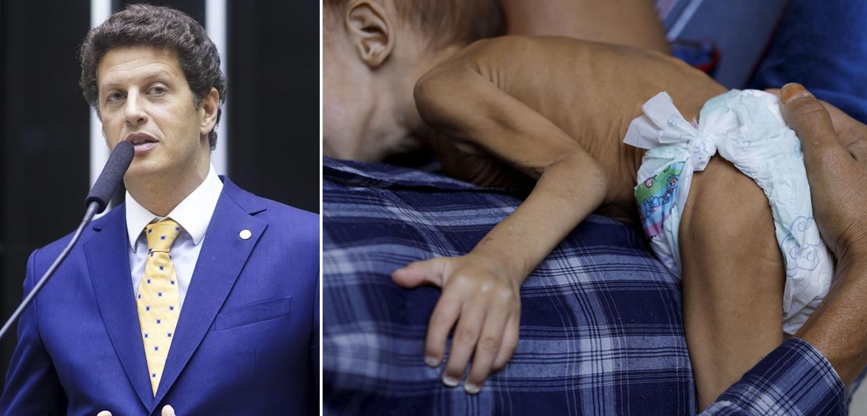 Ricardo Salles e indígena yanomami carrega seu filho de quatro anos que recebe cuidados médicos para desnutrição em Boa Vista