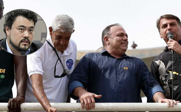 Leonardo Sakamoto, Eduardo Pazuello (camisa de botão) e Jair Bolsonaro (com microfone)