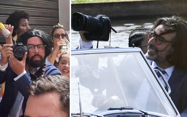 Homem fantasiado de Ricardo Stuckert e Ricardo Stuckert fotografando