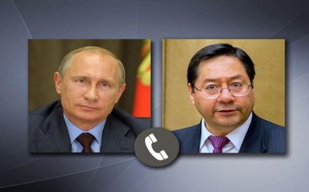 Vladimir Putin e Luís Arce